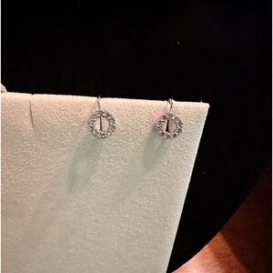 Women’s 14k white gold and diamond dainty drop earrings.